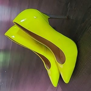 Neon yellow stilettos